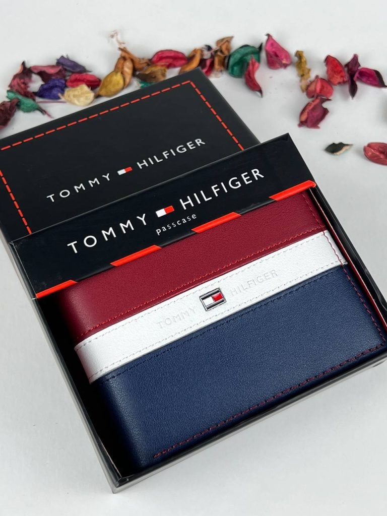 Tommy Hilfiger Passcase Wallet in leather, featuring the iconic tri-color block design (Navy, White, Red), box packaging.