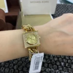Michael Kors Women's MK Chain Lock Watch MK4711, Signature All-Gold. - Image 6