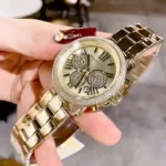 ⁦ساعة مايكل كورس حريمي MK7199 "برين" (Brynn)، بلون ذهبي أحادي.⁩ - الصورة ⁦5⁩