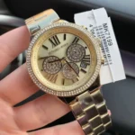 ⁦ساعة مايكل كورس حريمي MK7199 "برين" (Brynn)، بلون ذهبي أحادي.⁩ - الصورة ⁦7⁩