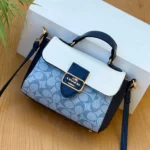 Coach Signature Canvas Mini Flap Bag with Top Handle and Crossbody Strap light sky blue color