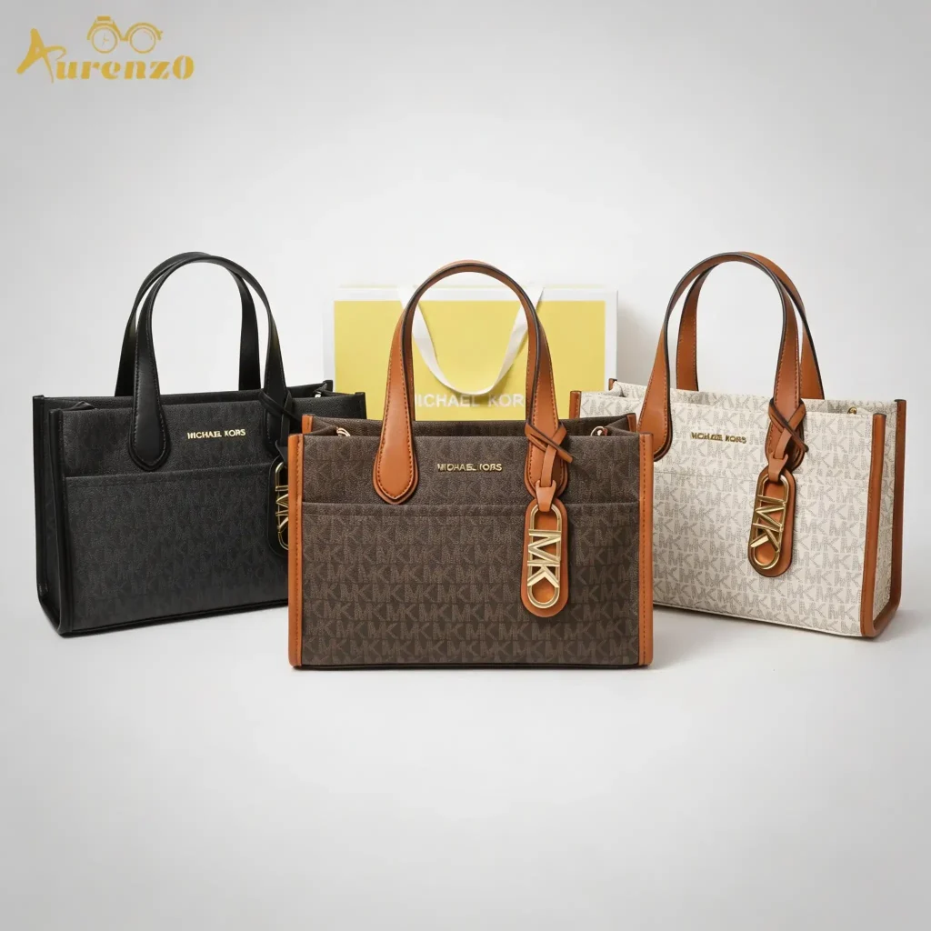 Michael Kors Mini Tote Bag, Signature PVC Canvas, Available in Vanilla/Cognac, Dark Brown, and All-Black, with gold-tone hardware and leather trim.