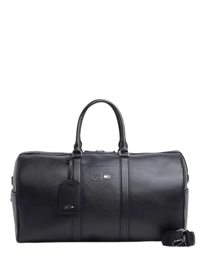 Tommy Hilfiger Travel Bag: Large black 100% leather duffle travel bag with reinforced handles and 51cm length for weekend trips.