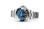 Rolex Deepsea: Luxury professional watch with blue gradient dial, silver Oystersteel bracelet, and black ceramic bezel.