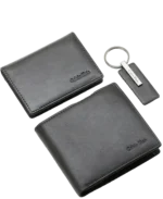 Calvin Klein Gift Set: 3-piece black 100% leather set including bifold wallet, slim cardholder, and logo keychain in a luxury gift box.