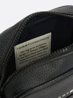 "Close-up of 3 Incredible angles of the Legendary Tommy Hilfiger Bag in black genuine leather, compact size 21x17x6 cm with premium TH metal logo."