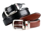 Tommy Hilfiger Belt: Reversible black and brown 100% genuine leather belt with rotating metallic buckle and 120 cm length.