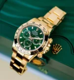 "7 Breathtaking views of the iconic Rolex Daytona Watch with green dial and gold stainless steel bracelet, showcasing its luxury chronograph features."