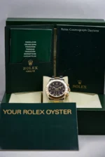 "7 Breathtaking views of the iconic Rolex Daytona Watch with black dial and gold-silver stainless steel strap, highlighting the 42mm automatic luxury movement."