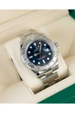 "5 Breathtaking views of the iconic Rolex Yacht-Master Watch with blue dial and silver stainless steel strap, highlighting its premium nautical luxury design."